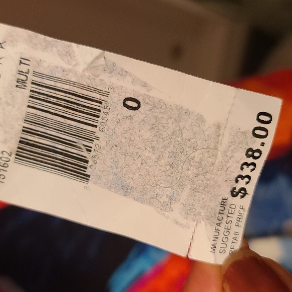 Trina Turk multi color romper, has pockets. Its a size 0 but runs big(2-4) - Picture 8 of 9